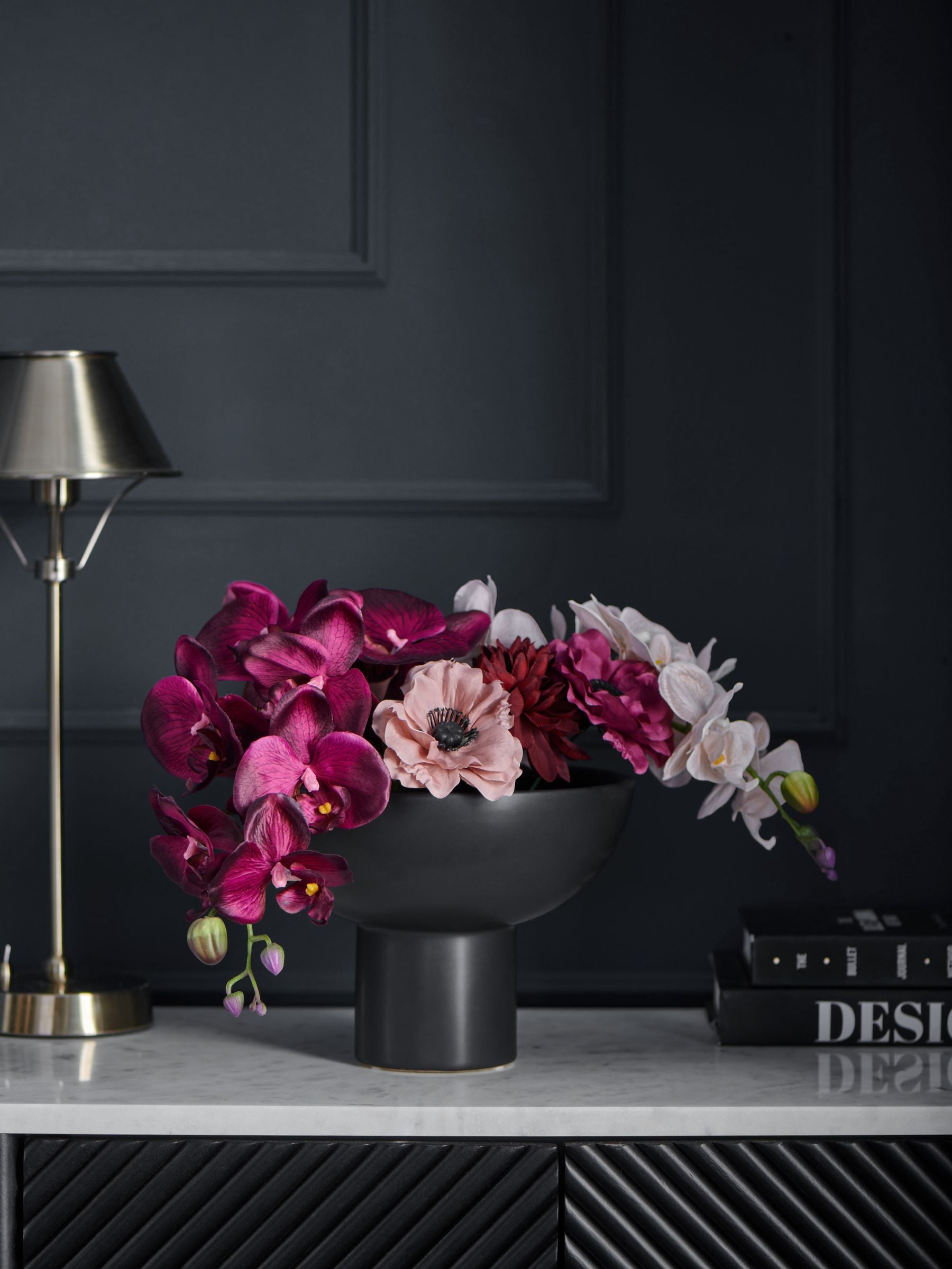 Purple artificial orchid in black contemporary vase 50cm, imported from the UK