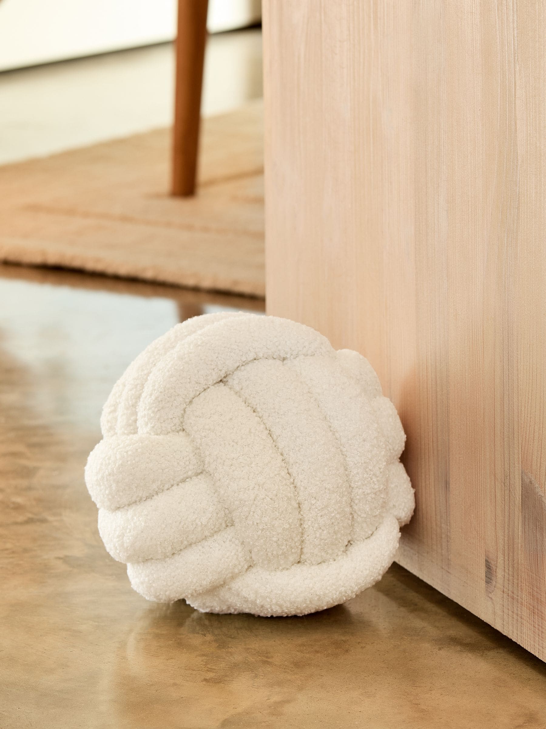 Natural Boucle Knot doorstop, imported from the UK