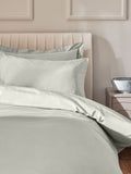Pale sage green duvet cover and pillowcase set, imported from the UK