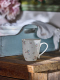 Ceramic Mug with Pink Floral Print and Ruffle Top