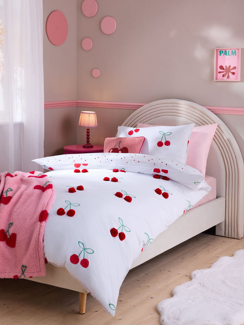 Red Cherry Poms printed polycotton duvet cover and pillowcase set, imported from the UK