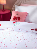 Red Cherry Poms printed polycotton duvet cover and pillowcase set, imported from the UK