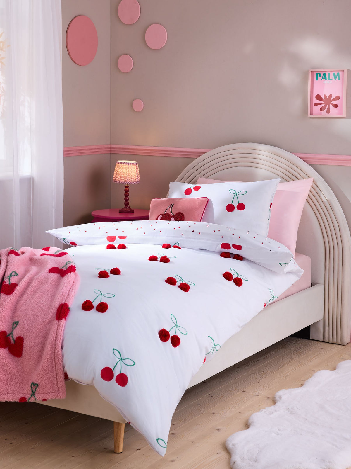 Red Cherry Poms printed polycotton duvet cover and pillowcase set, imported from the UK