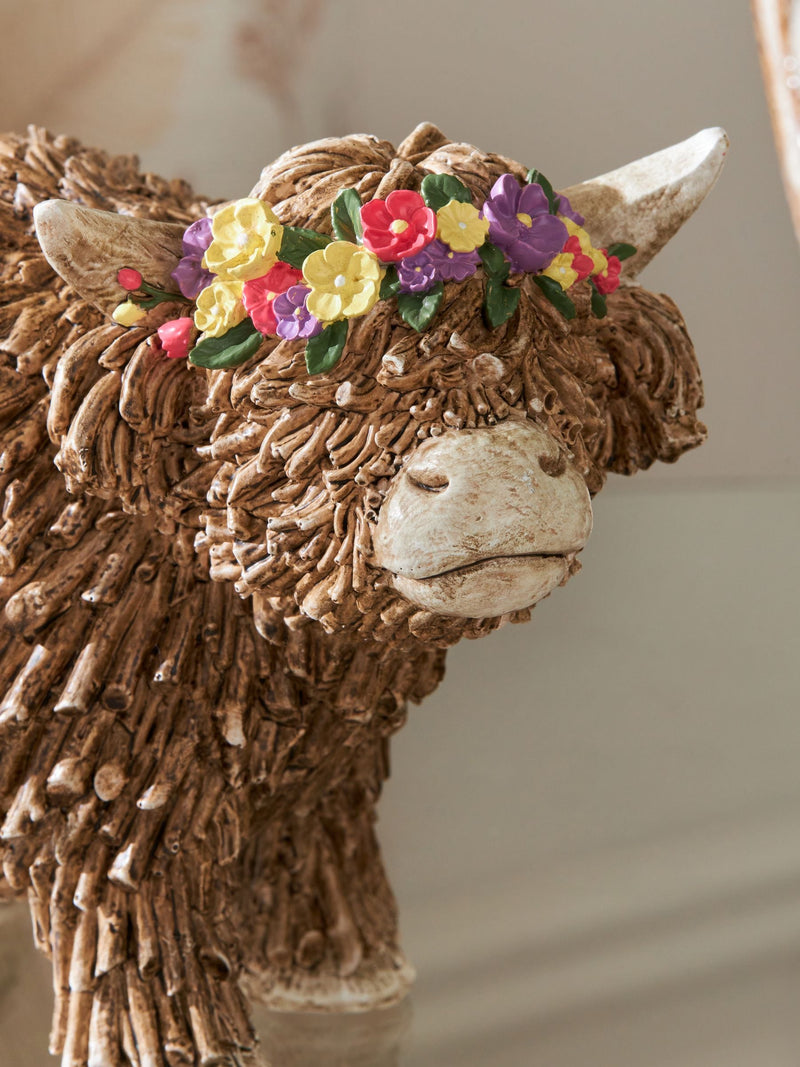 Hamish Highland cow ornament with floral crown medium, imported from the UK