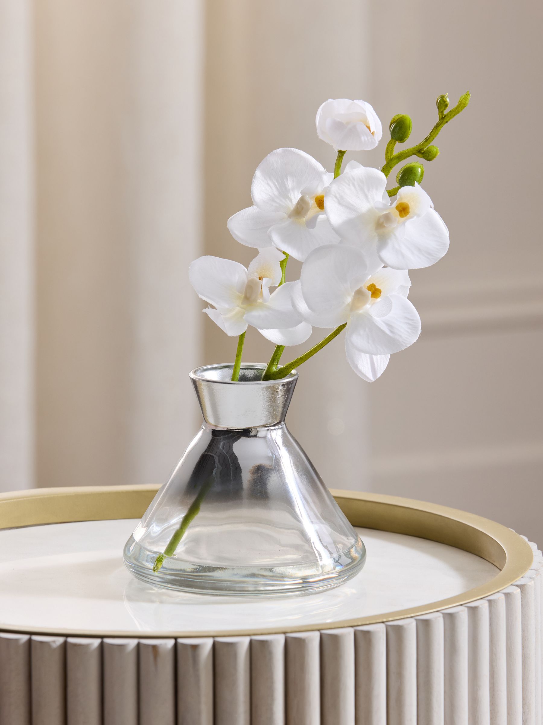 Artificial white orchid in glass vase 23cm tall (British brand)