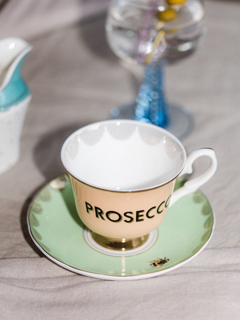 Yvonne Ellen Multi Boozy Prosecco teacup and saucer 8cm height (British brand)