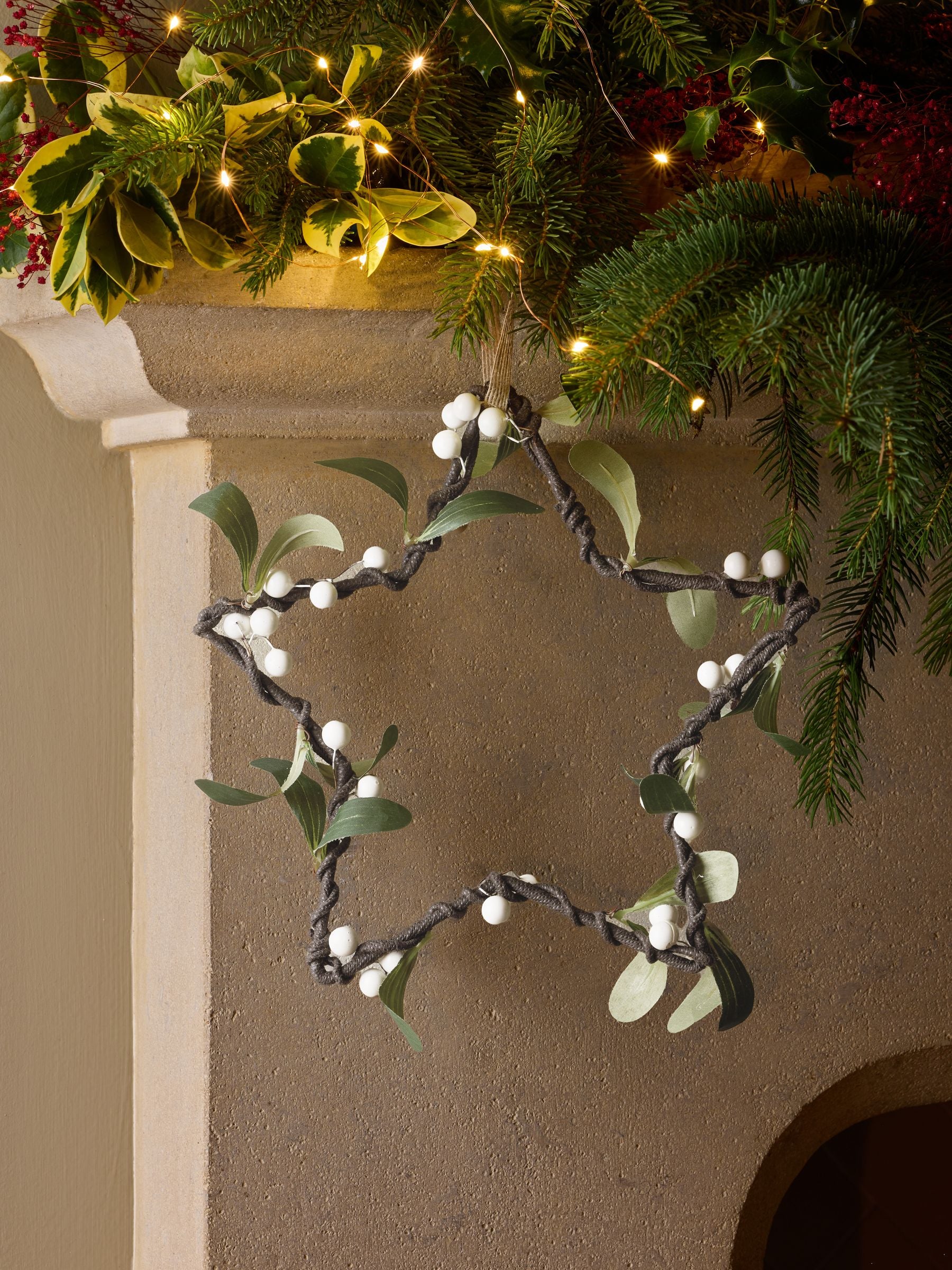 Green faux star hanging Christmas decoration 28cm height, UK version
