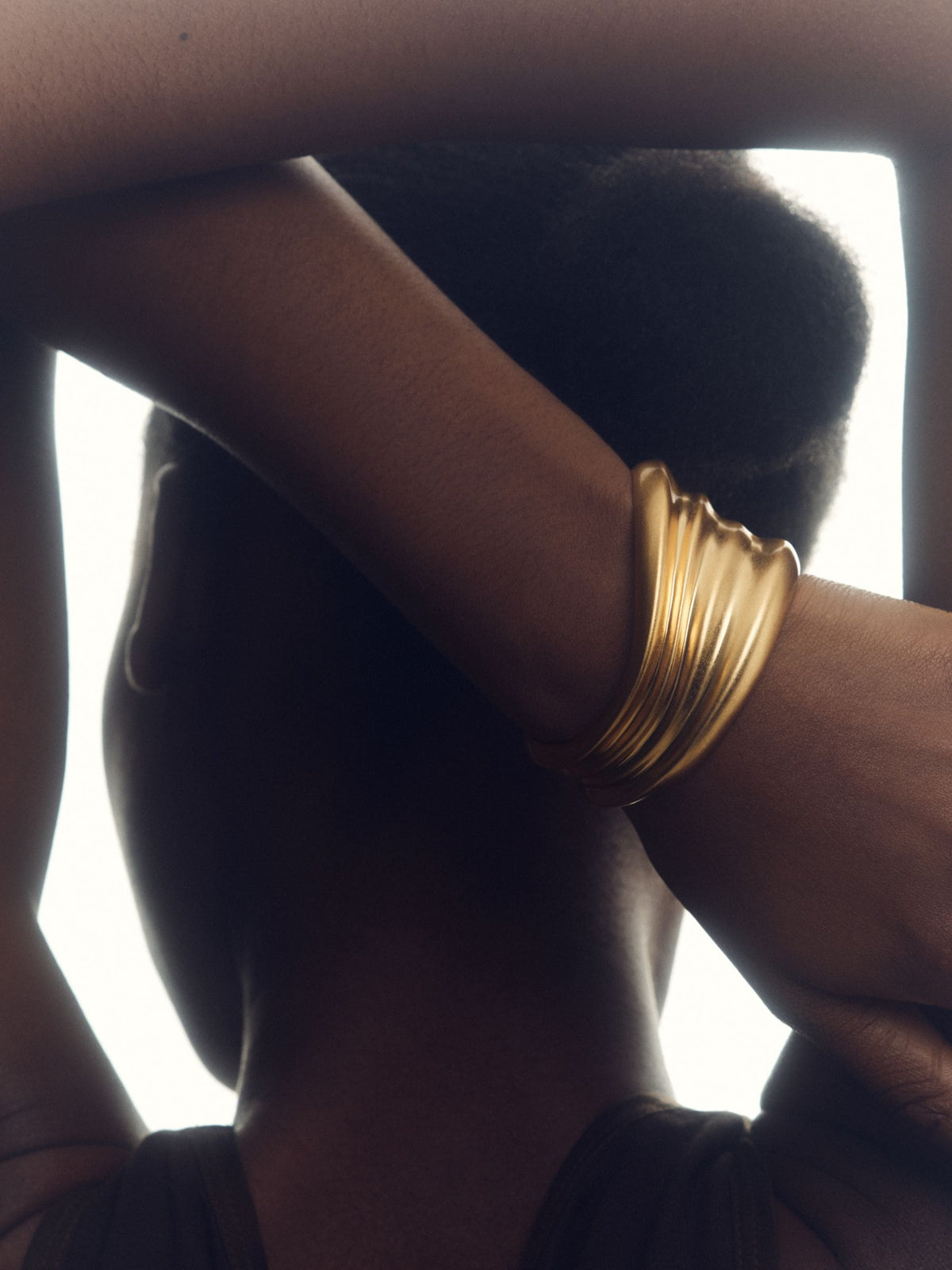 Reiss gold tone Florence fluid sculpted cuff bracelet, imported from the UK