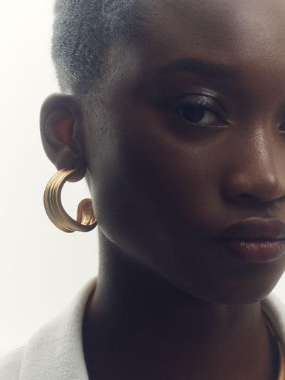 Gold Tone Fluid Hoop Earrings with Hypoallergenic Posts