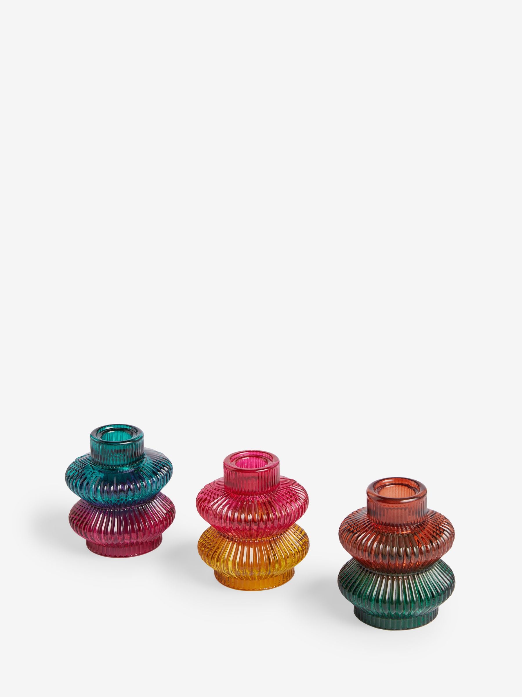 Glass tea light and taper candle holders in multicolour (British brand)