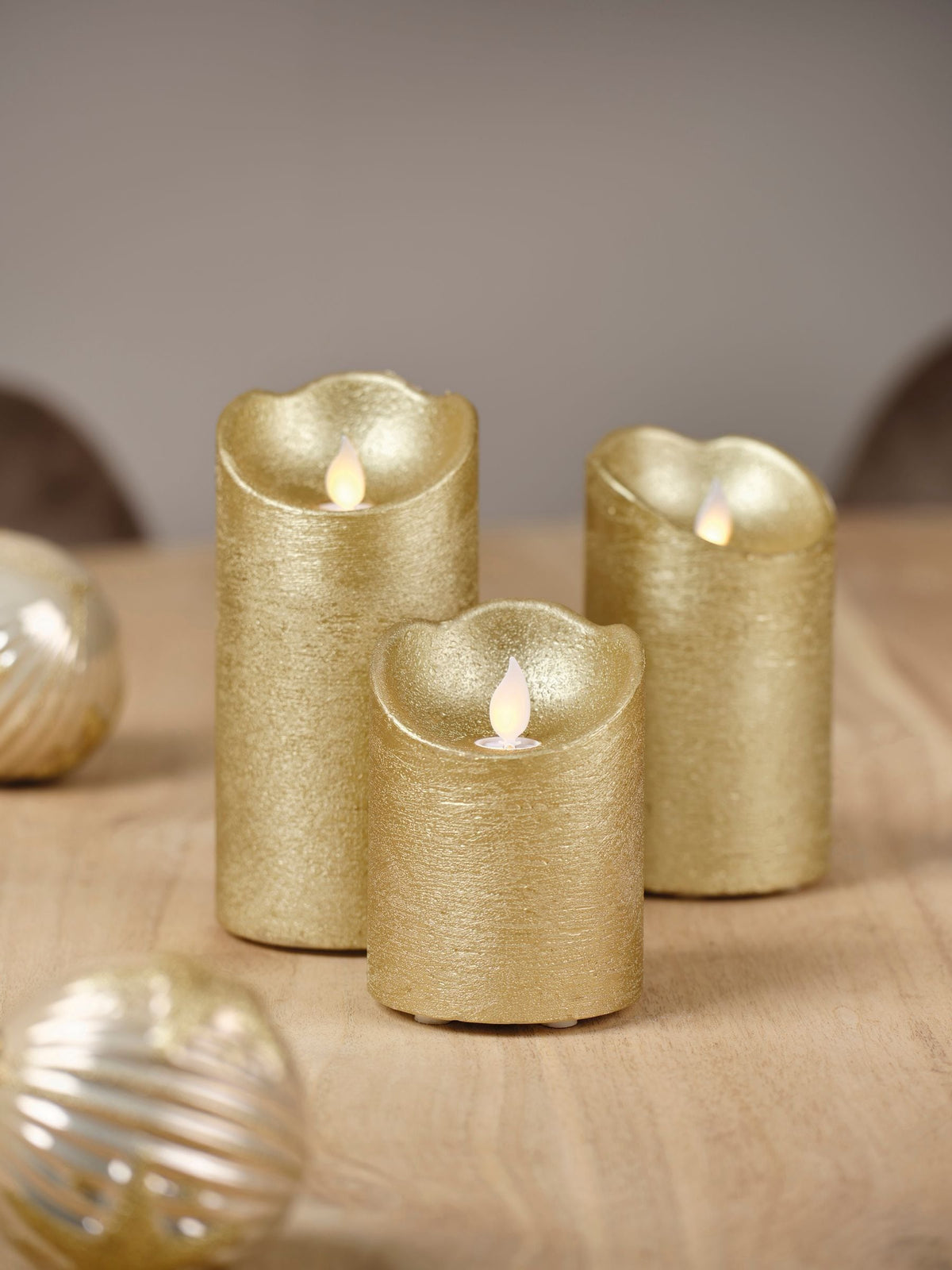 Lumineo gold tone LED candles set of 3, UK version