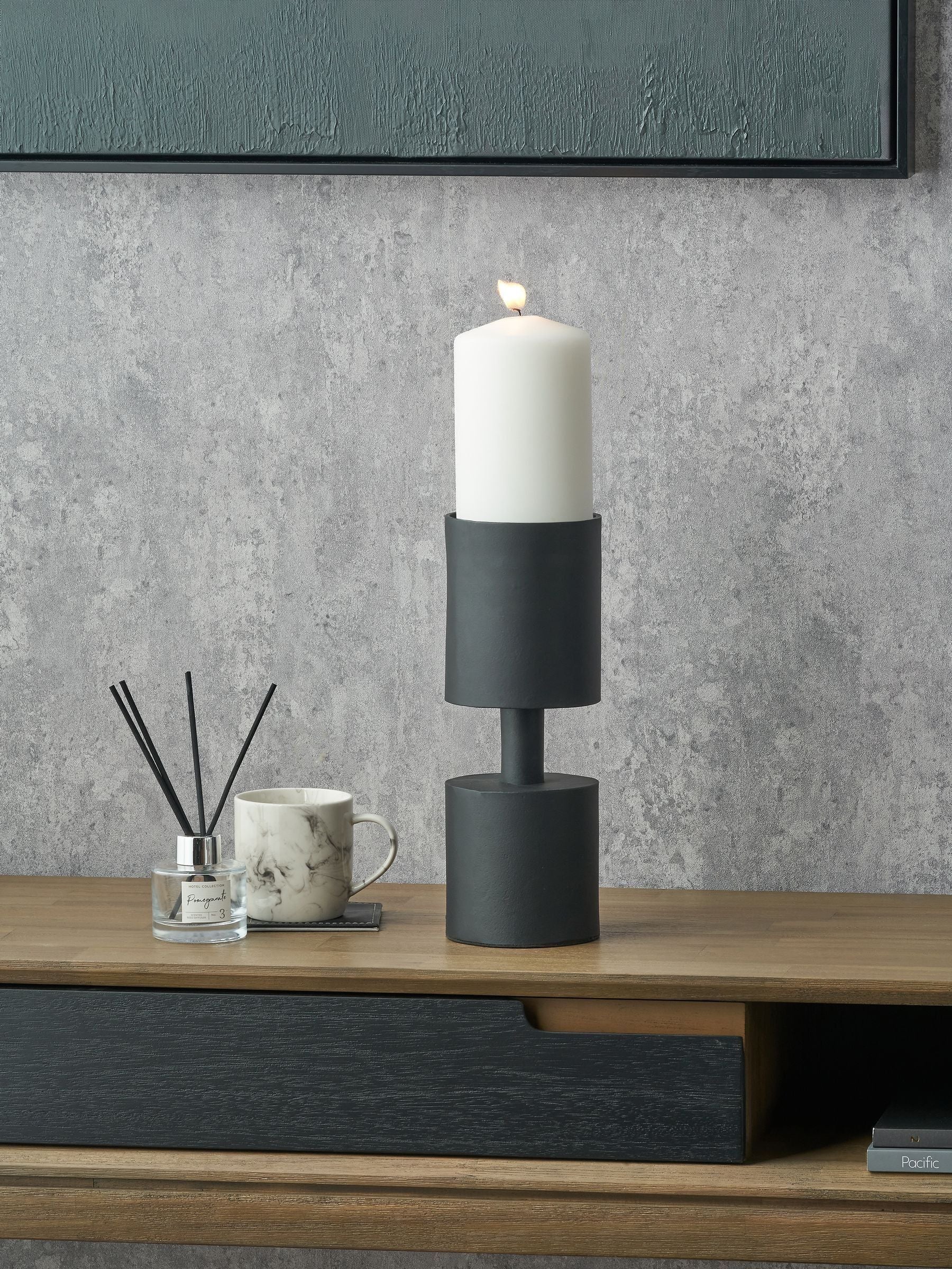 Pacific Lifestyle black metal pillar candle holder small, imported from the UK