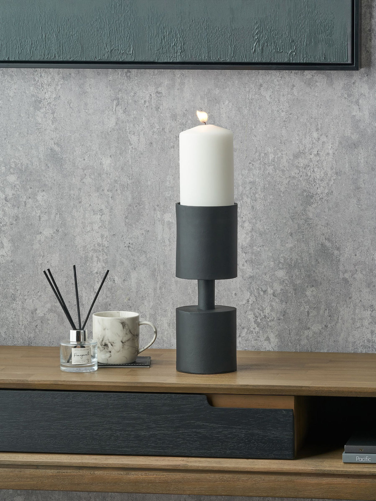 Pacific Lifestyle black metal pillar candle holder small, imported from the UK