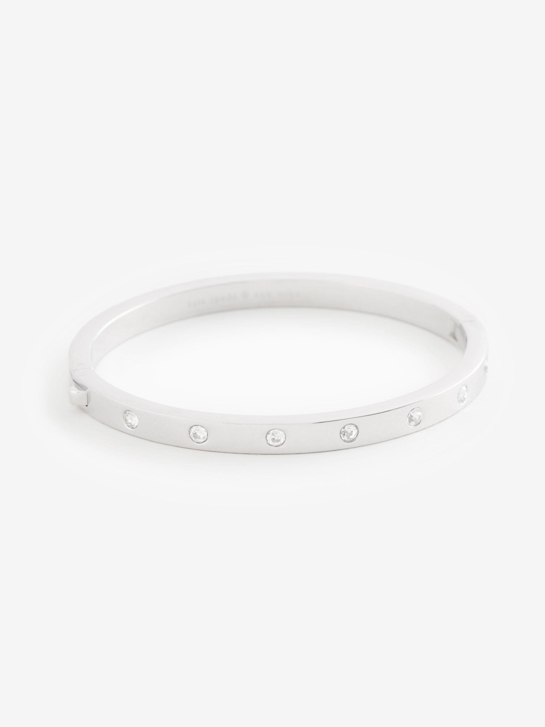 Kate Spade silver set in stone hinged bangle (British brand)