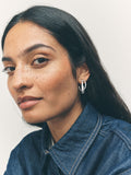 Silver tone crossover hoop earrings (British brand)