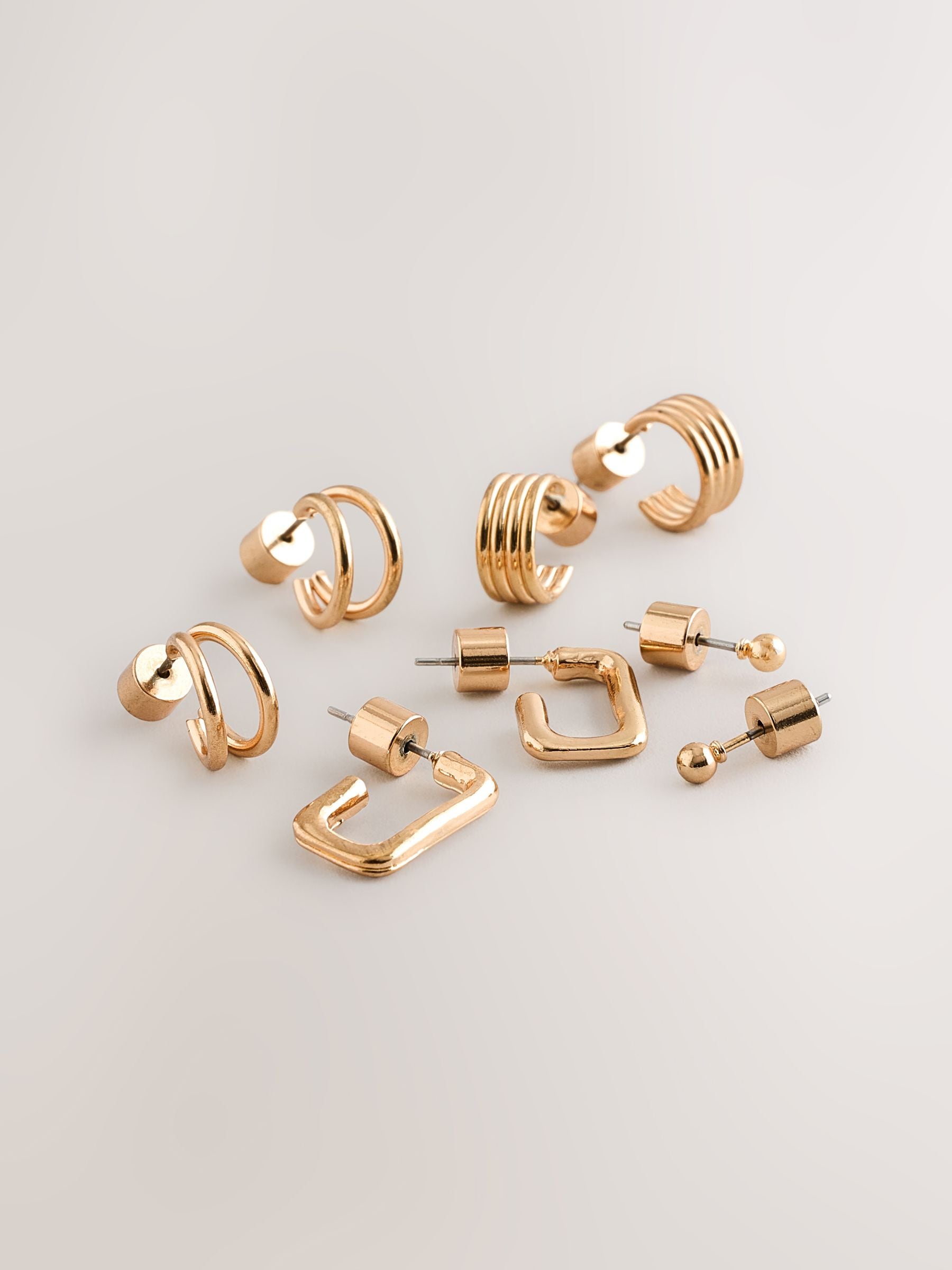 Gold tone mini hoop earrings 4 pack, UK version
