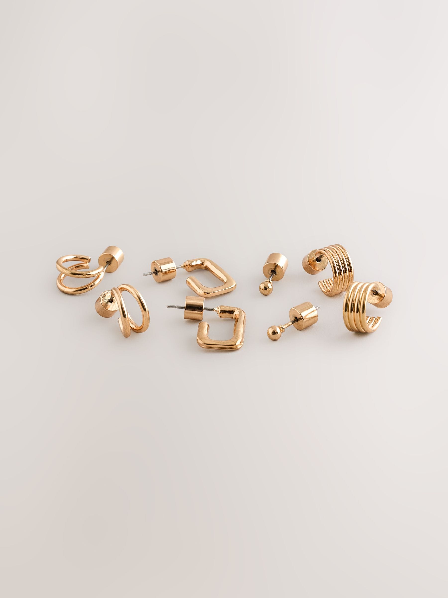 Gold tone mini hoop earrings 4 pack, UK version