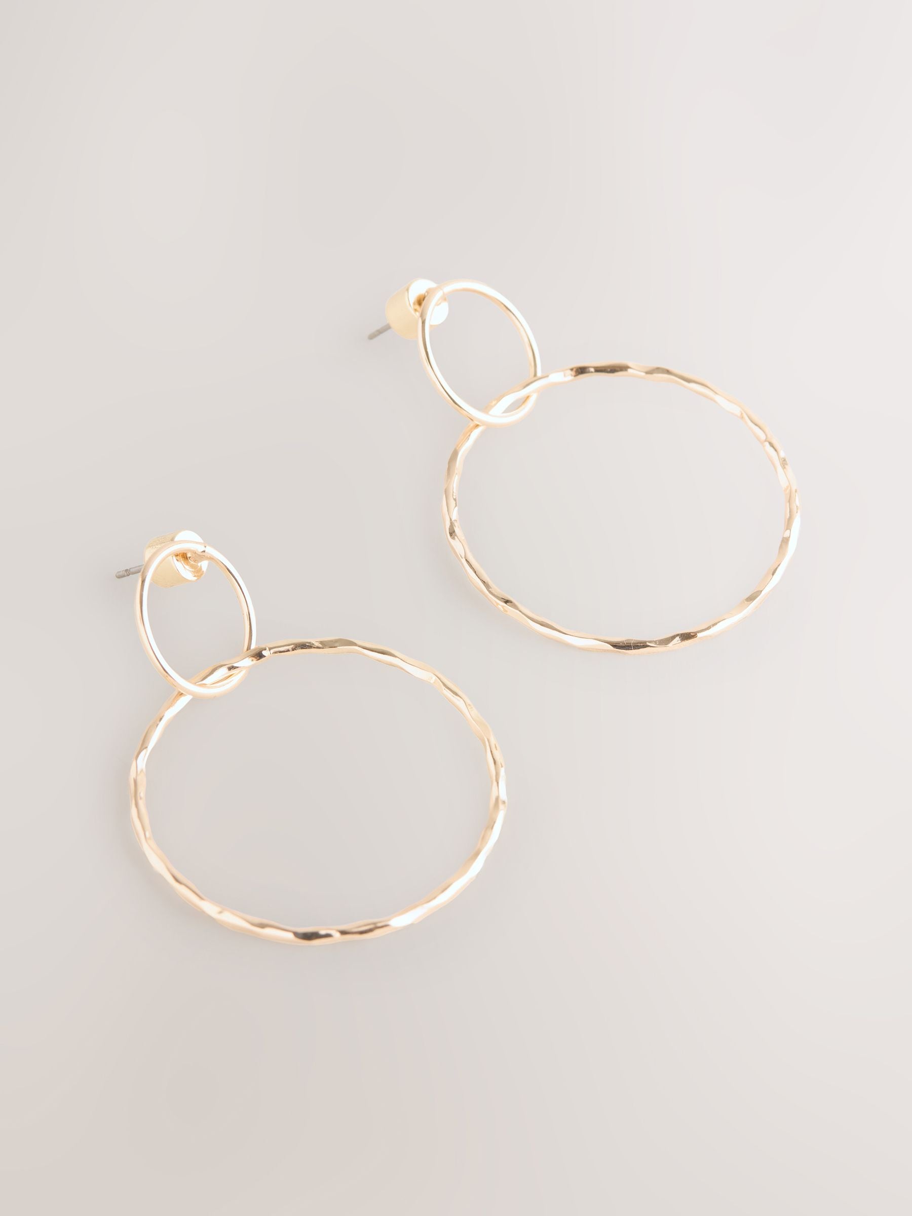 Gold Tone Circle Drop Earrings 91% Recycled brass, UK version