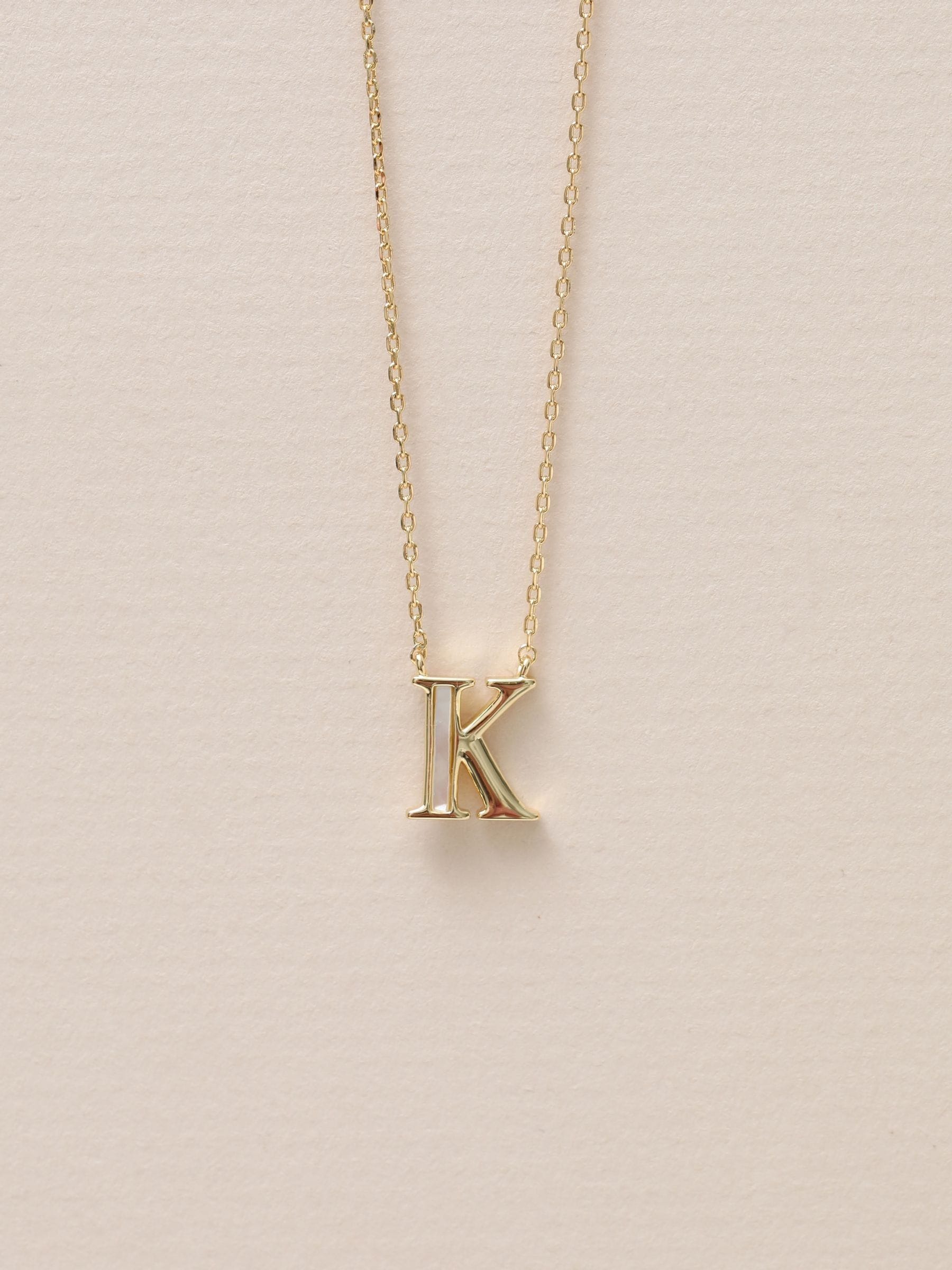 Inicio initial K pendant necklace, UK version