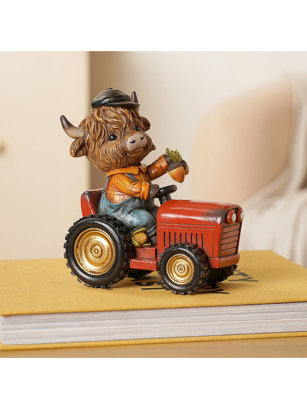 Country Living Brown Highland Cow on Tractor ornament 16cm - British product
