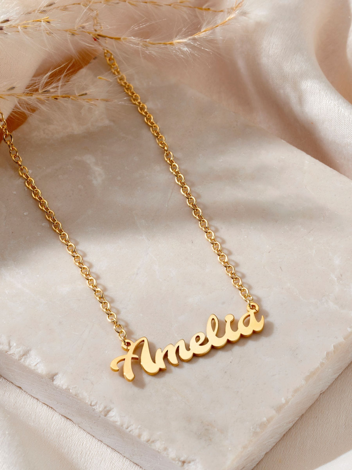 Posh Totty Designs gold tone curved name necklace, imported from the UK