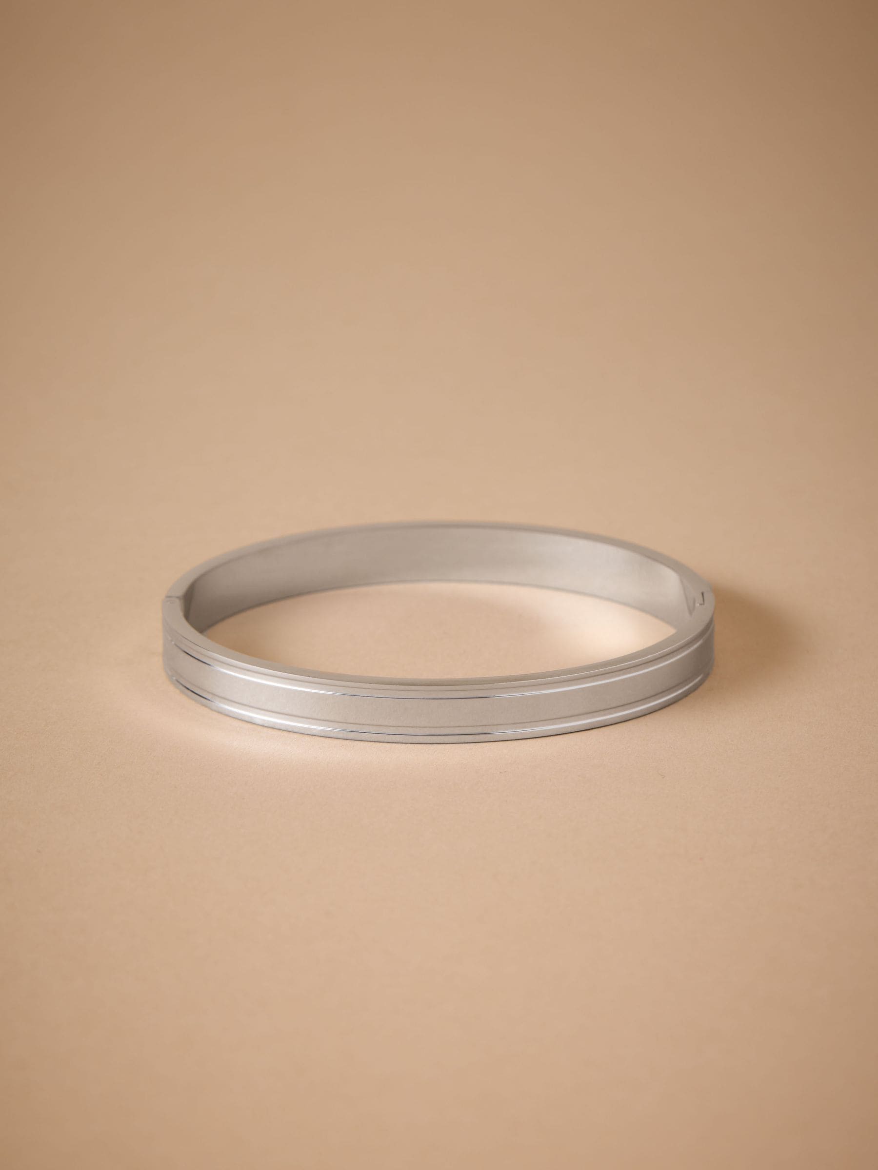 Stainless steel bangle (British brand)