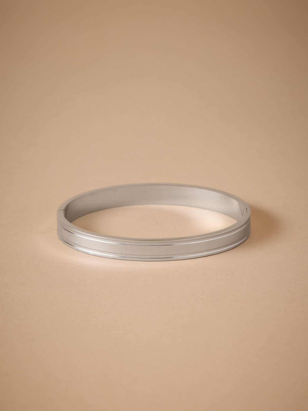 Stainless steel bangle (British brand)