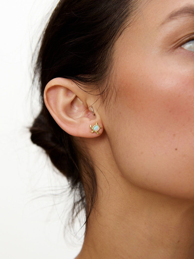 Oliver Bonas gold plated opalite turtle stud earrings, imported from the UK