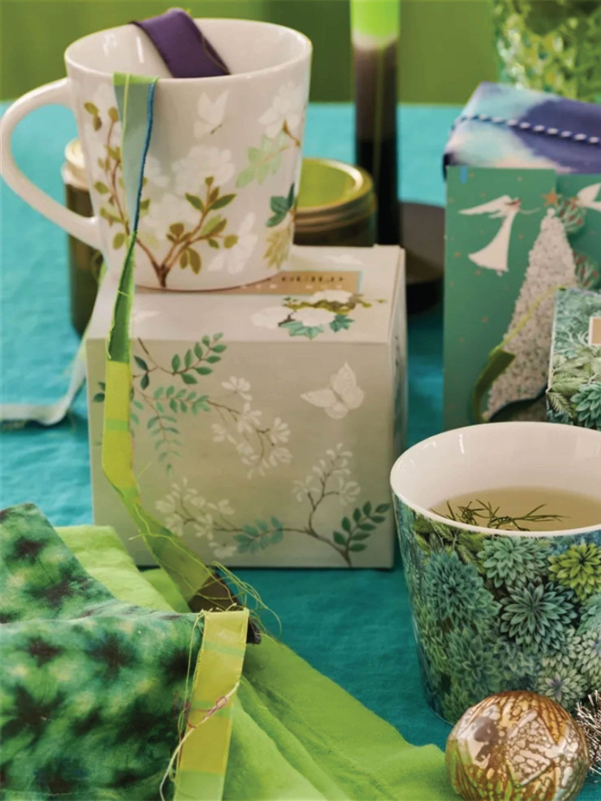 Set of 4 Designers Guild celadon Fleur Orientale porcelain mugs - British product