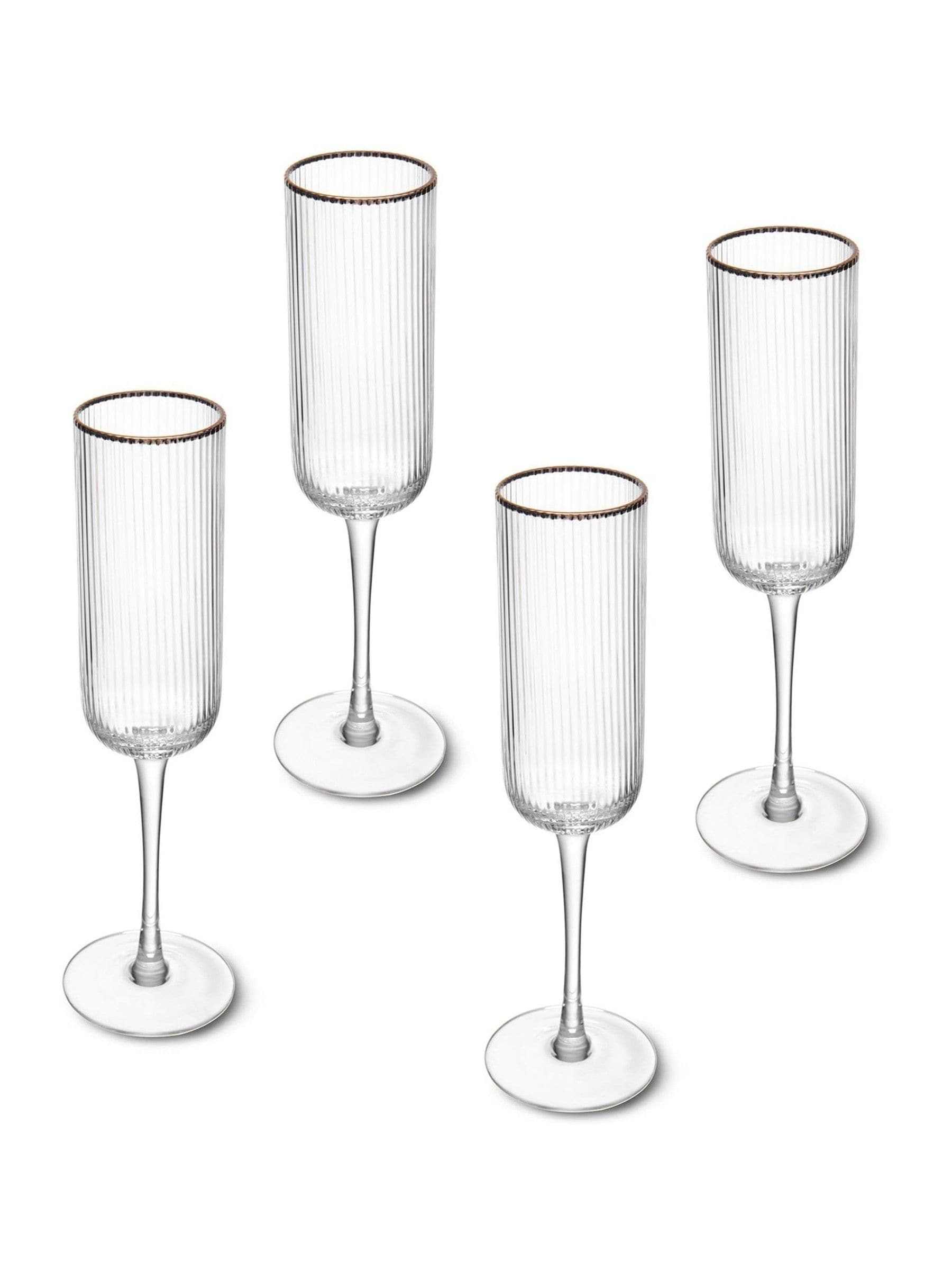 Mikasa gold champagne flutes set of 4, imported from the UK