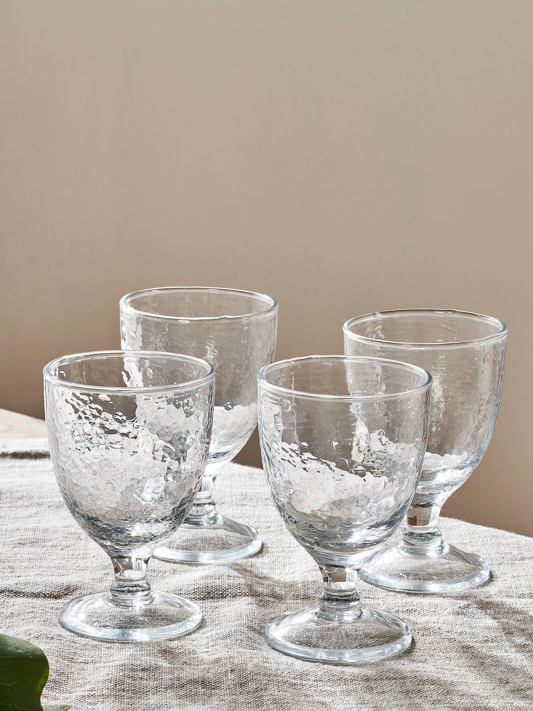 Nkuku set of 4 clear Yala hammered wine glasses, imported from the UK