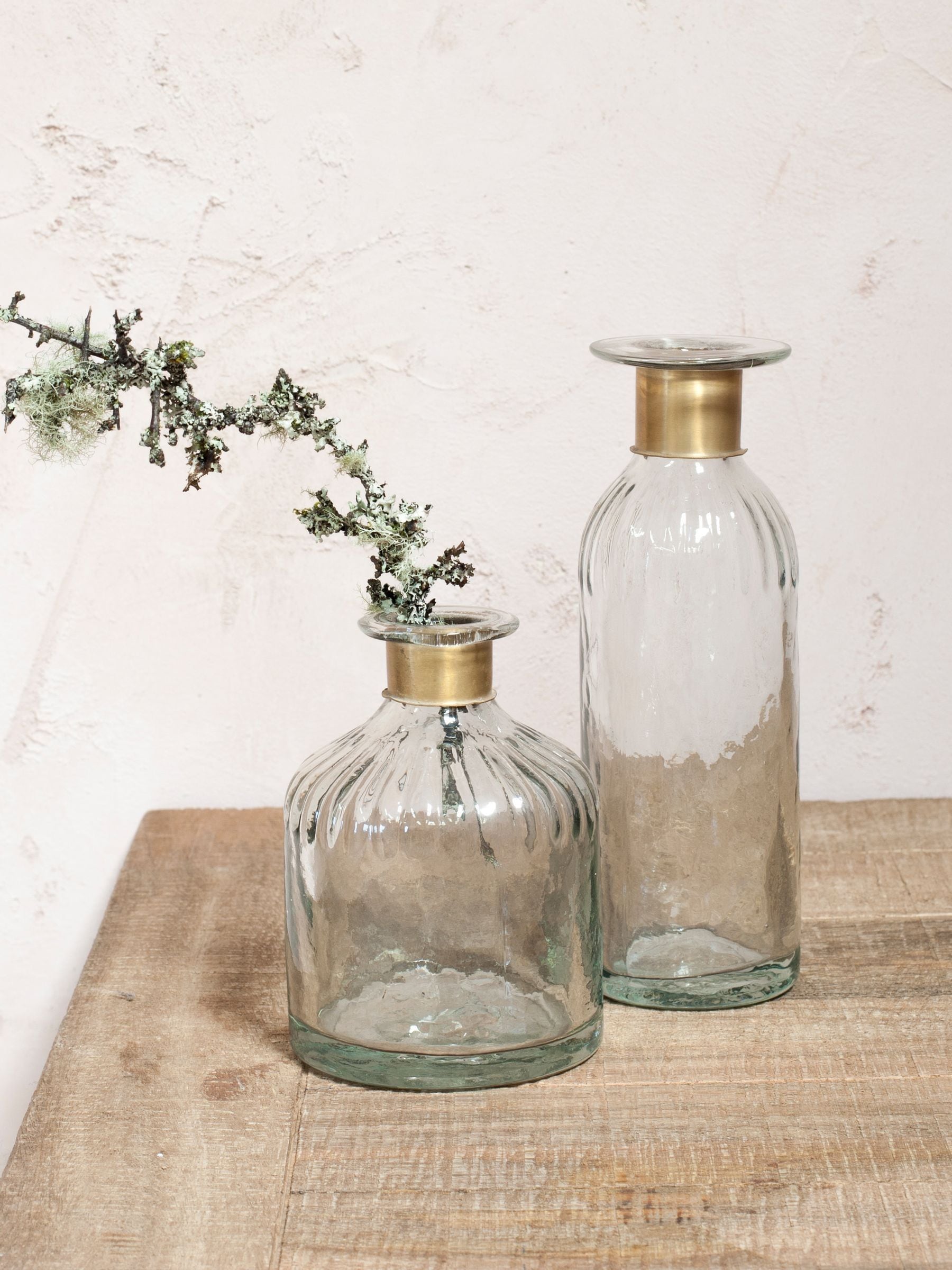 Nkuku Brass Chara Lines hammered glass bottle, imported from the UK