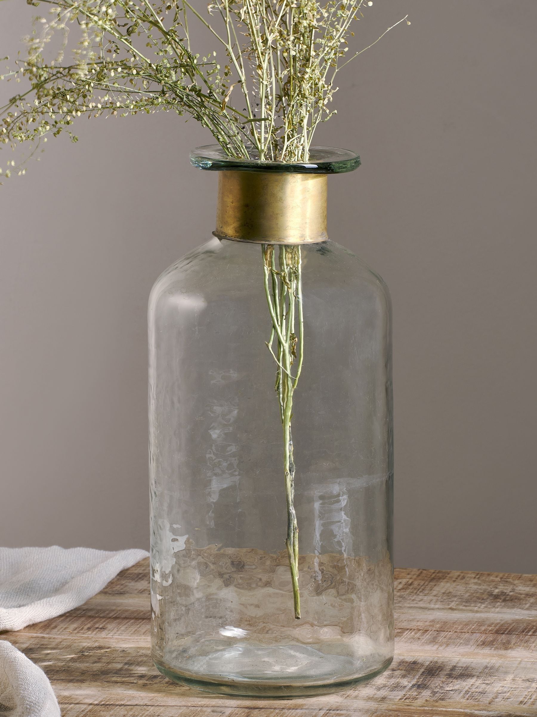 Nkuku Clear Chara hammered glass bottle 39cm height, imported from the UK