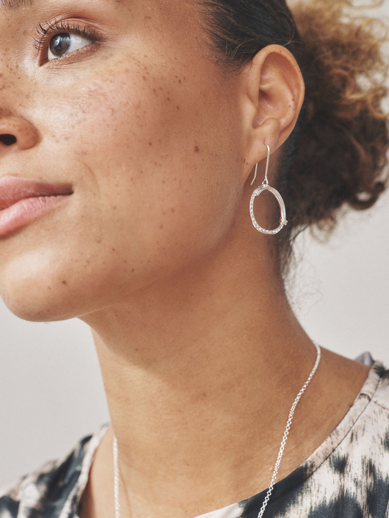 Silver Tone Open Circle Earrings with Sparkle Detail