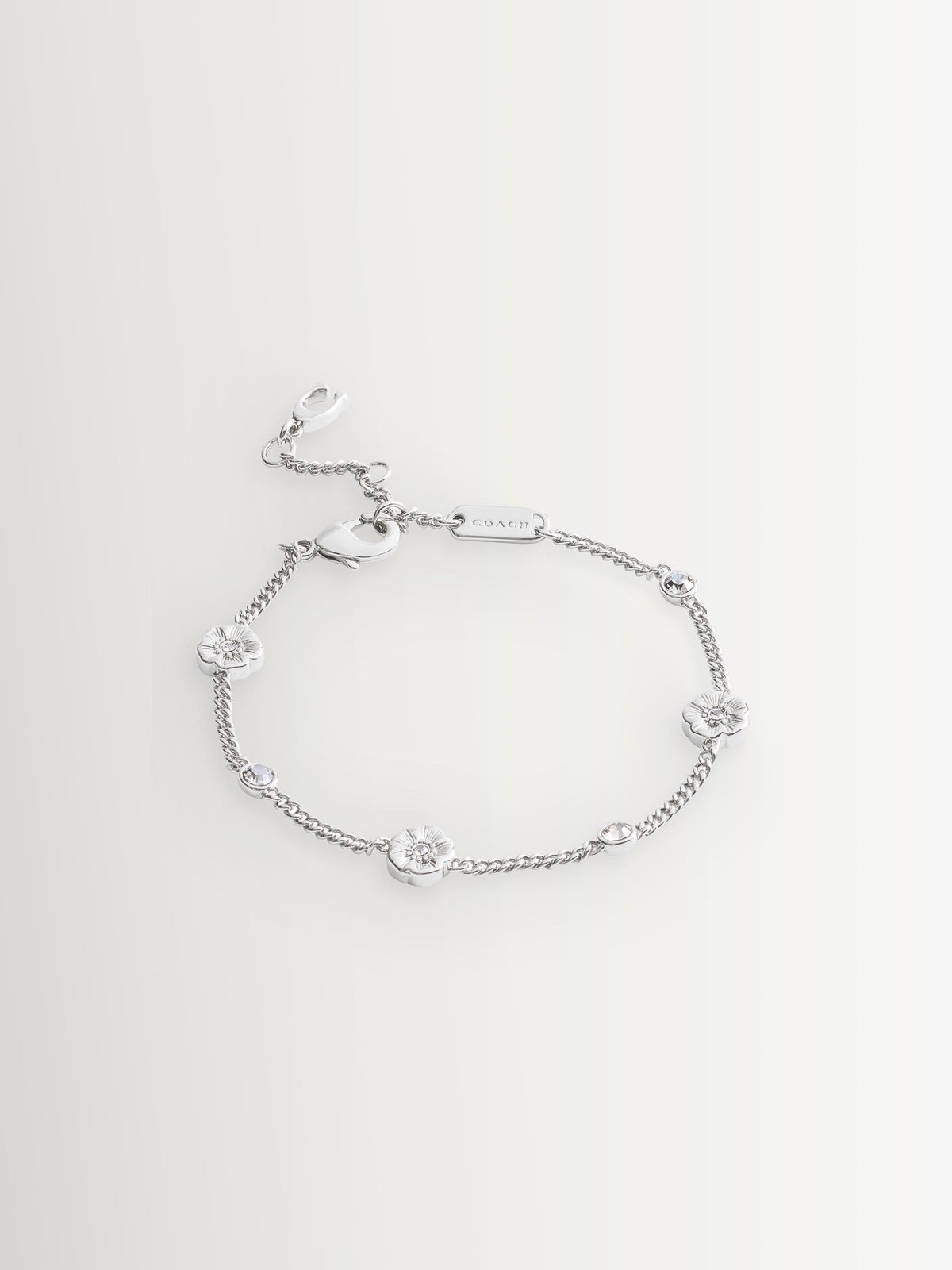 Coach silver tone signature tea rose strand bracelet - British product