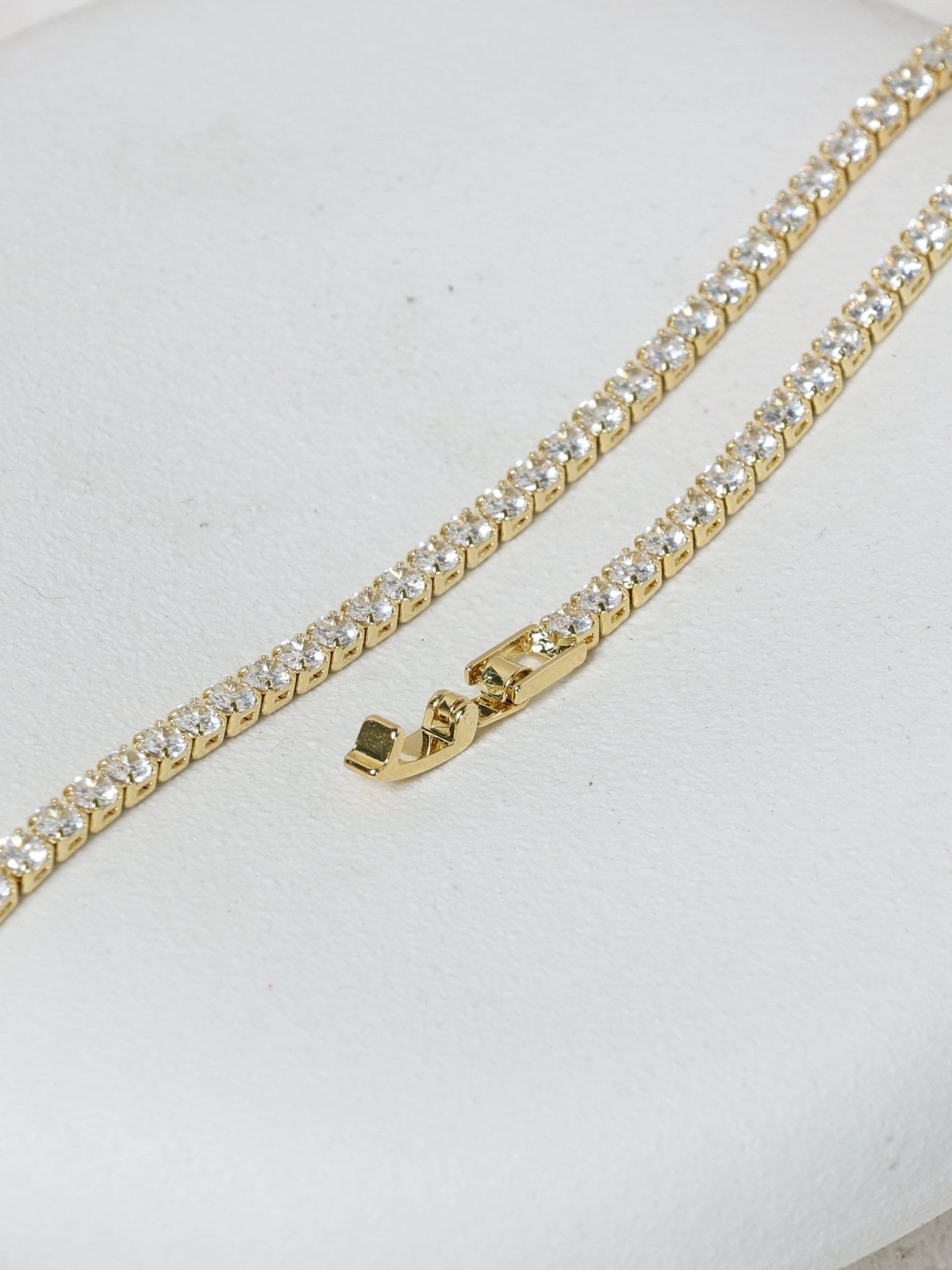 Jon Richard gold tone cubic zirconia round tennis bracelet 190.5mm, UK version