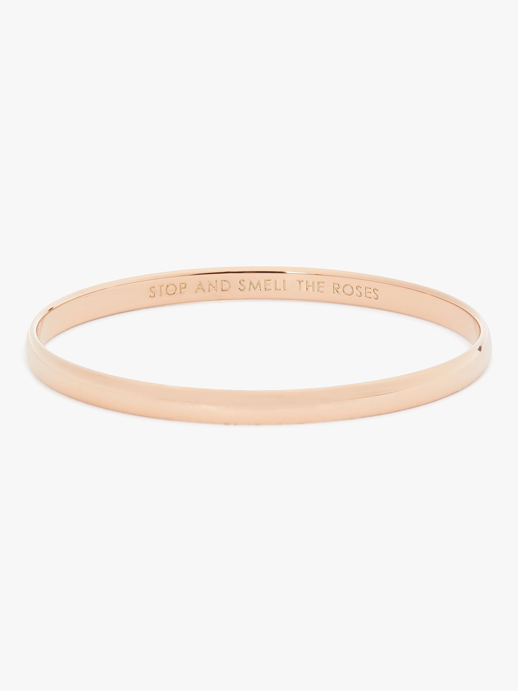 Kate Spade rose gold tone idiom bangle, UK version