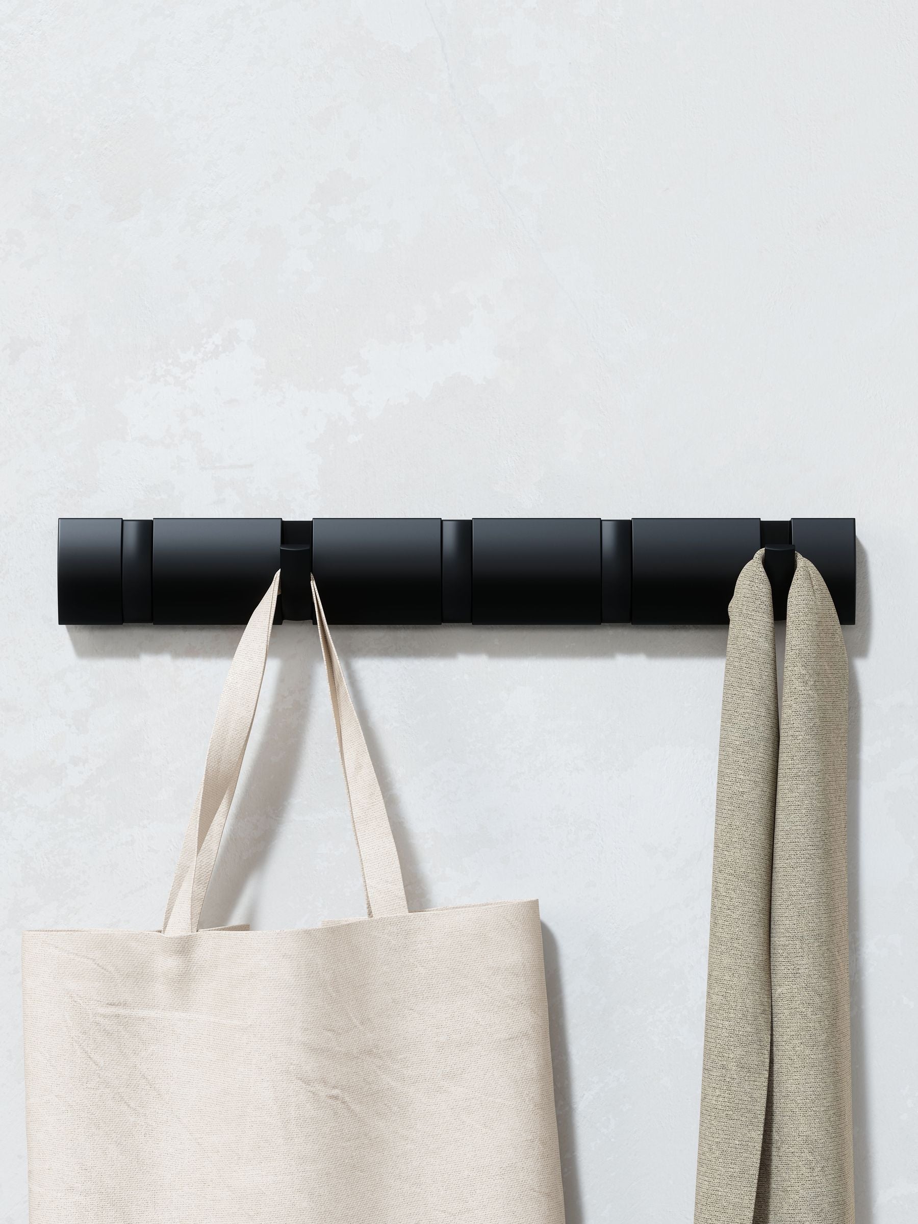 Umbra wall mounted coat rack with retractable hooks (British brand)