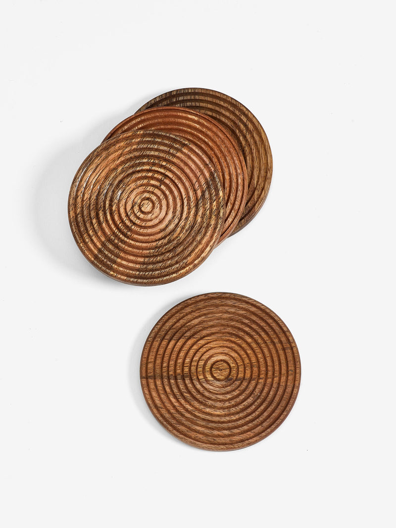 Set of 4 Natural Bronx etched wooden coasters, 10cm round (British brand)