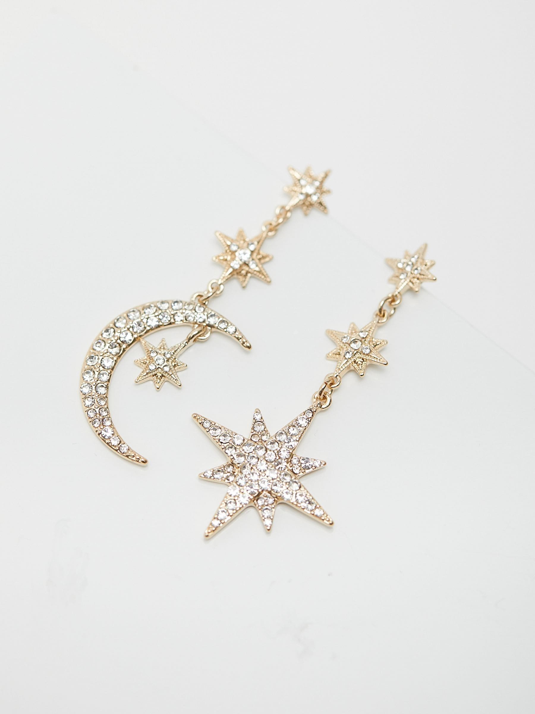 Mood gold tone stars and moon drop earrings, imported from the UK