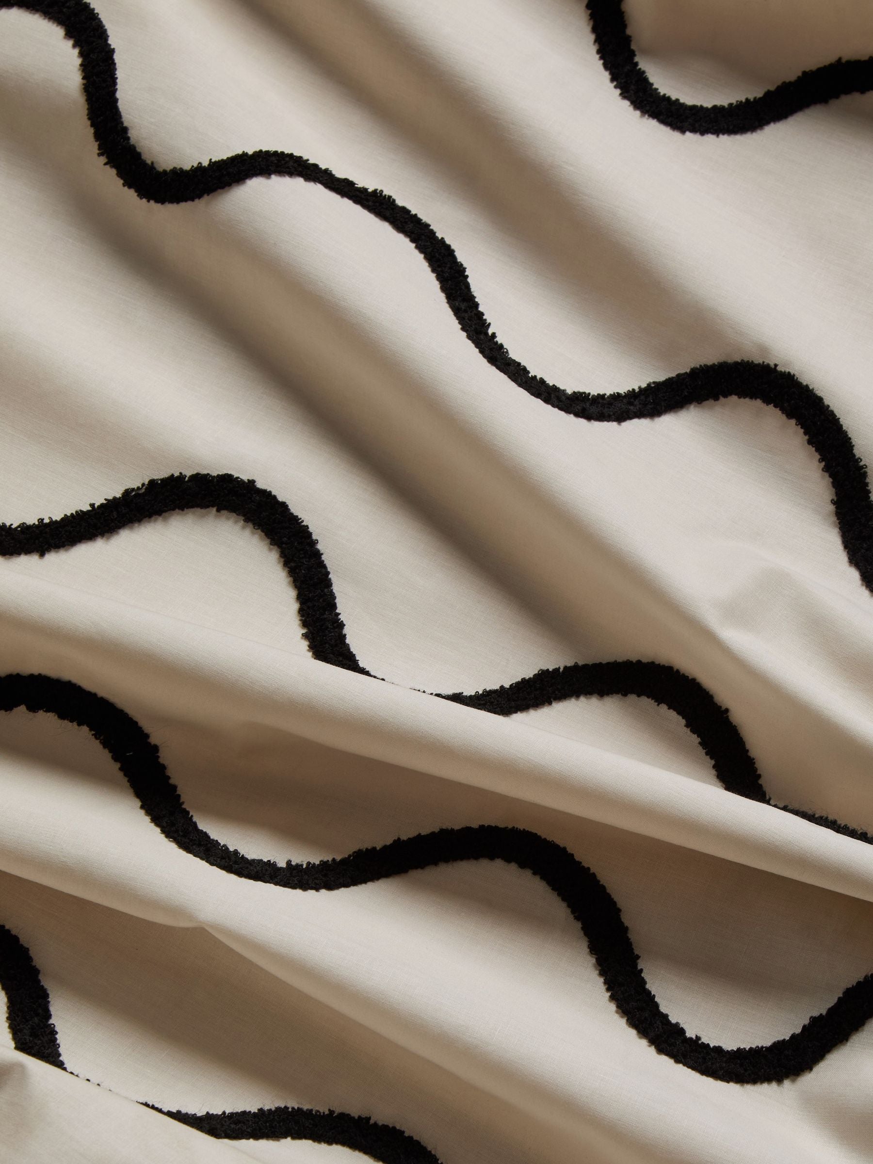 Monochrome tufted wave duvet cover and pillowcase set, imported from the UK