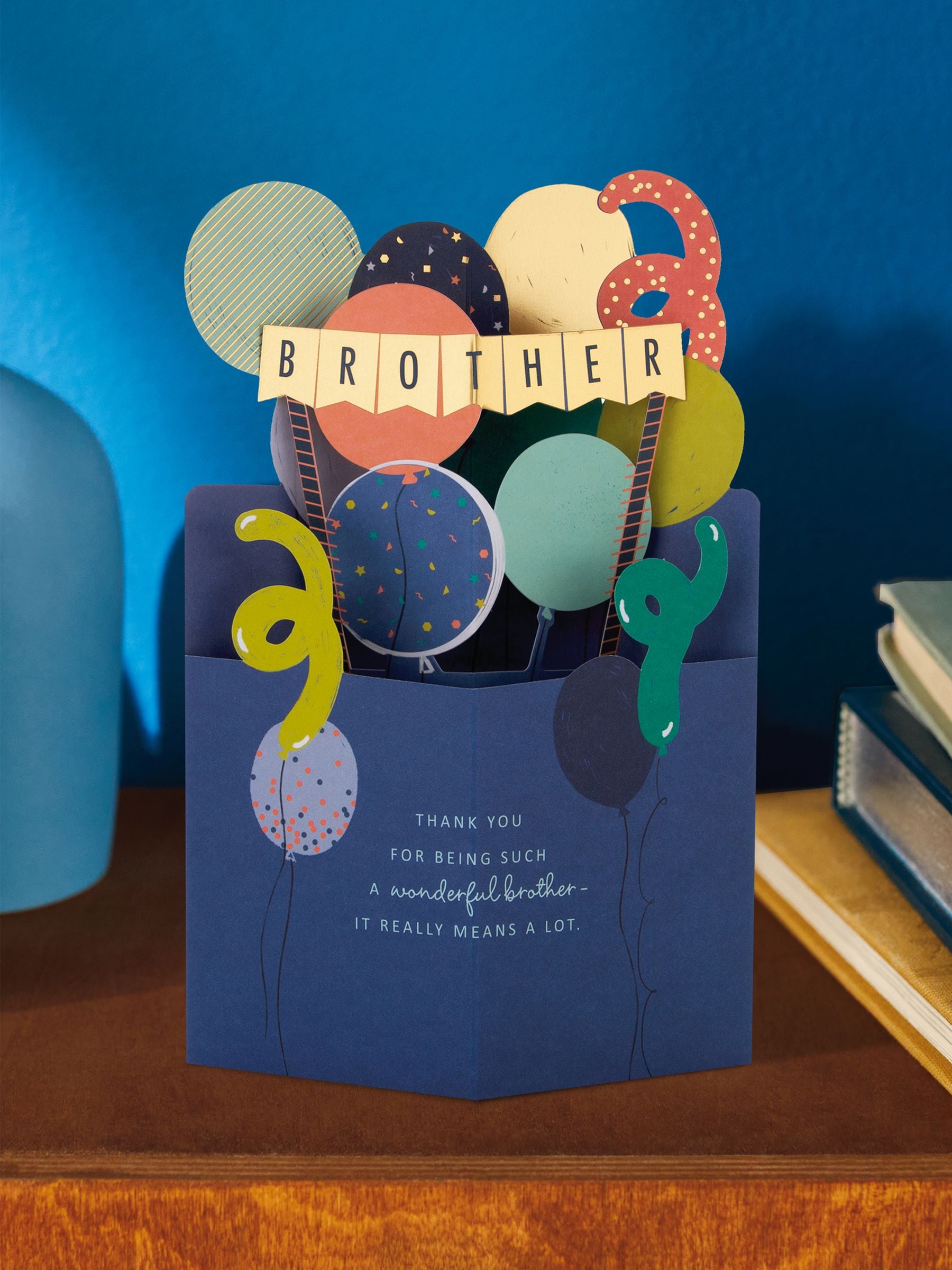 Hallmark blue birthday card for brother with 3D balloons design, UK version