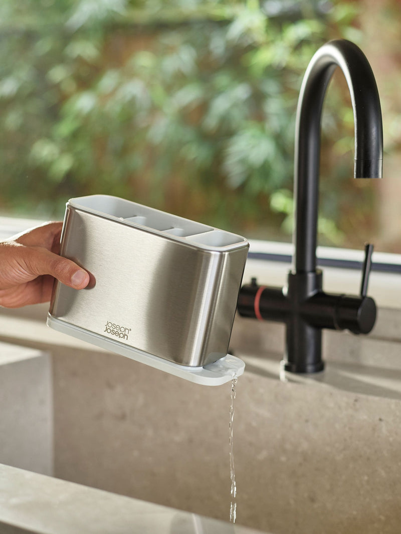 Joseph Joseph stainless-steel cutlery drainer with light stone surface, UK version