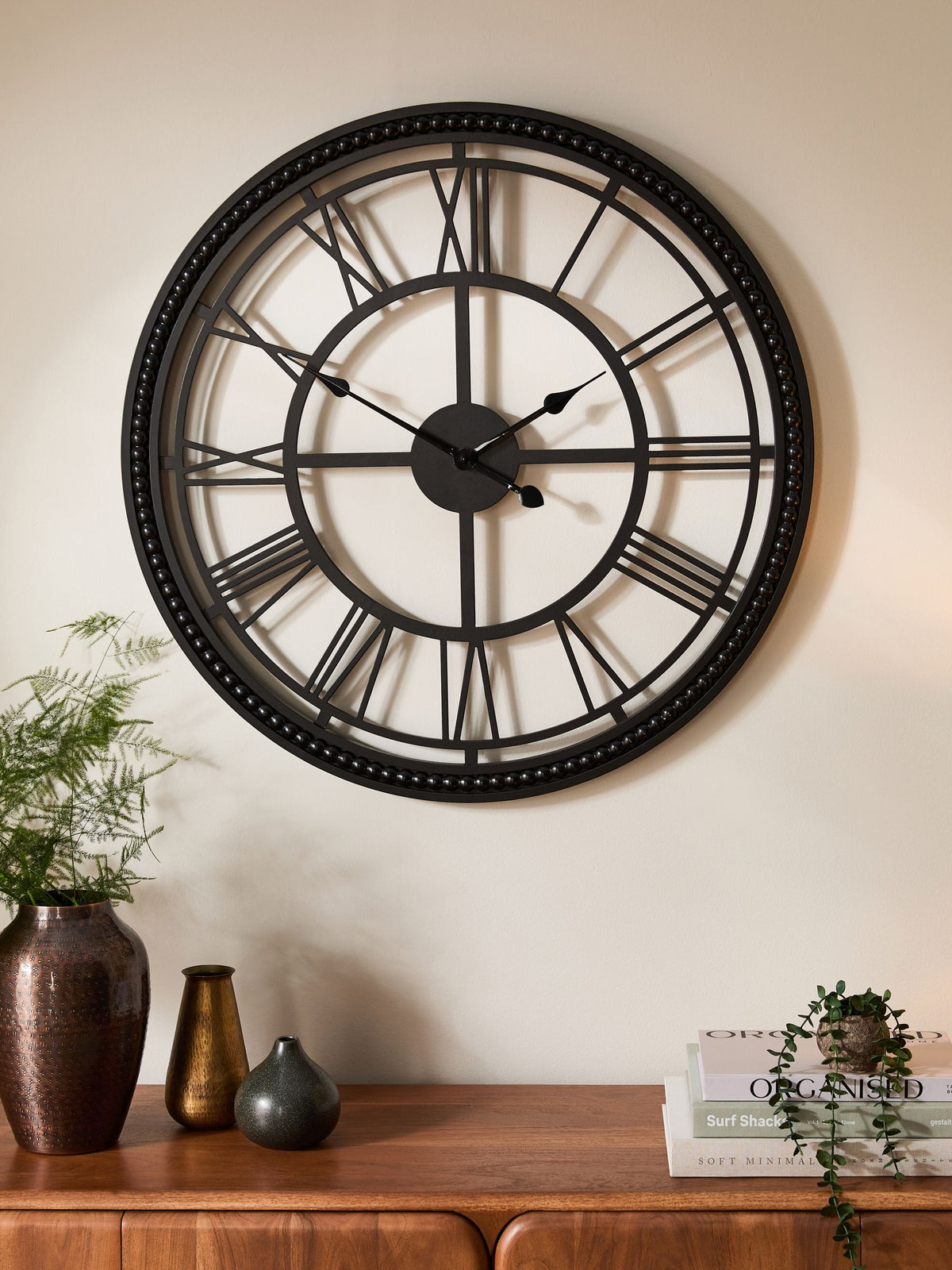 Black bobbin wall clock with 75cm diameter - British product