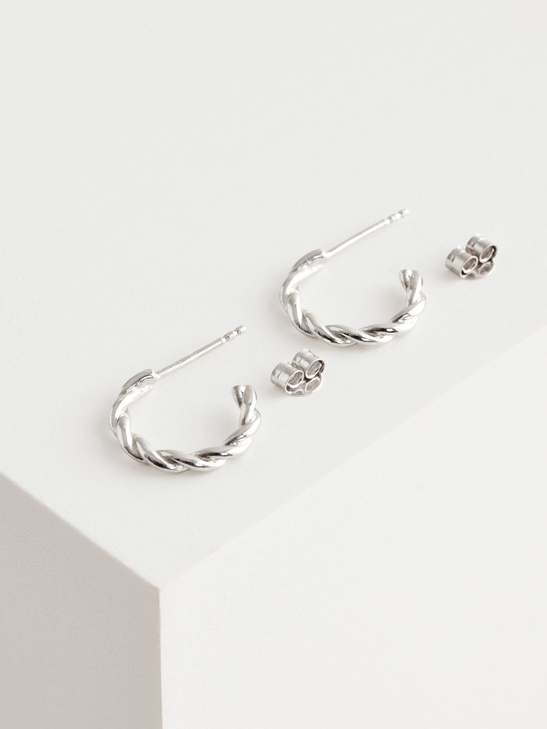 Sterling silver twist hoop earrings (British brand)