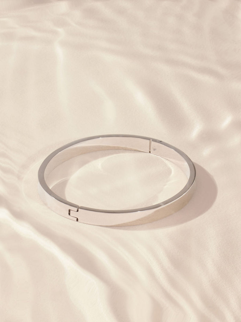 Silver tone stainless steel bangle (British brand)