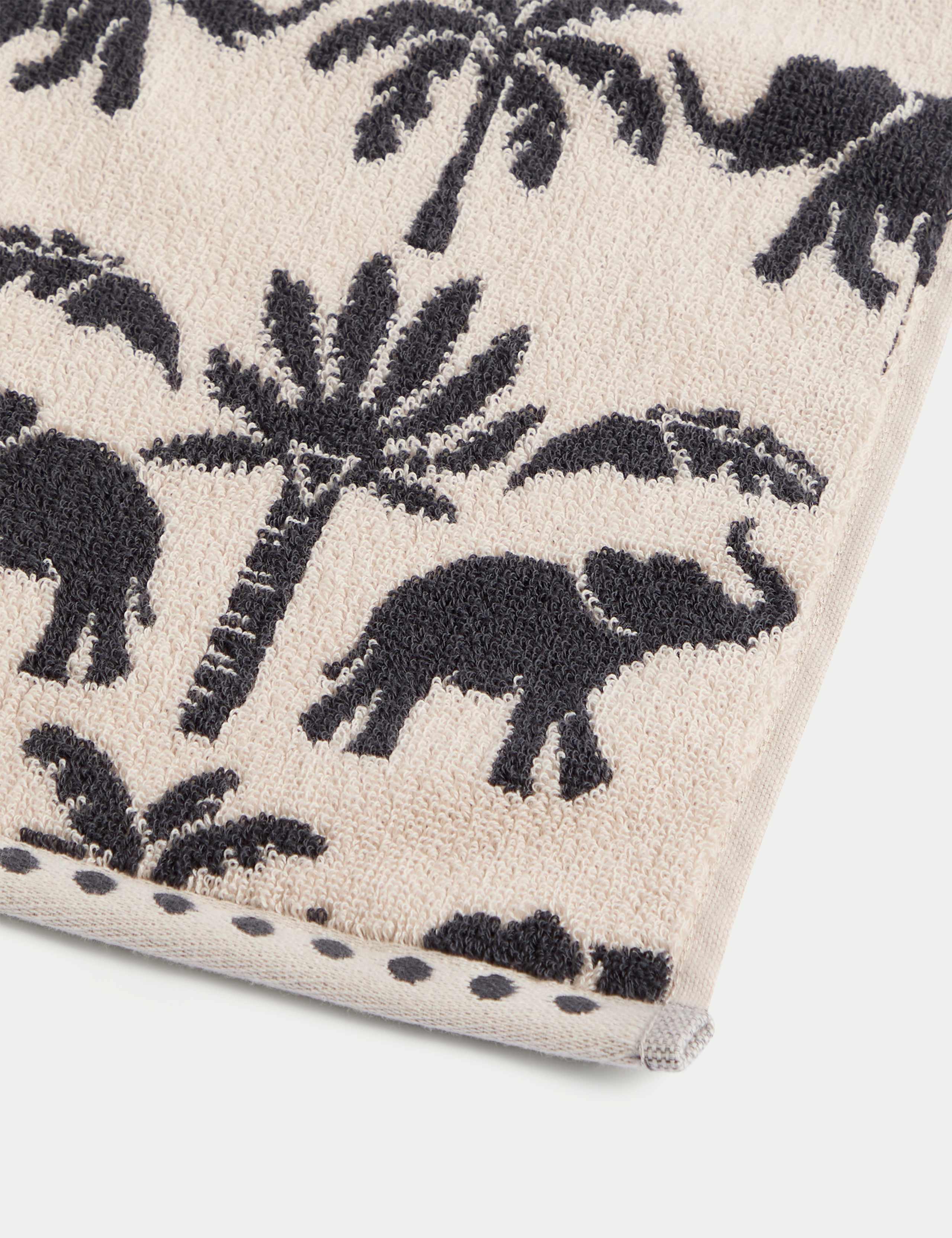 Pure cotton towel with elephant and palm tree design, imported from the UK