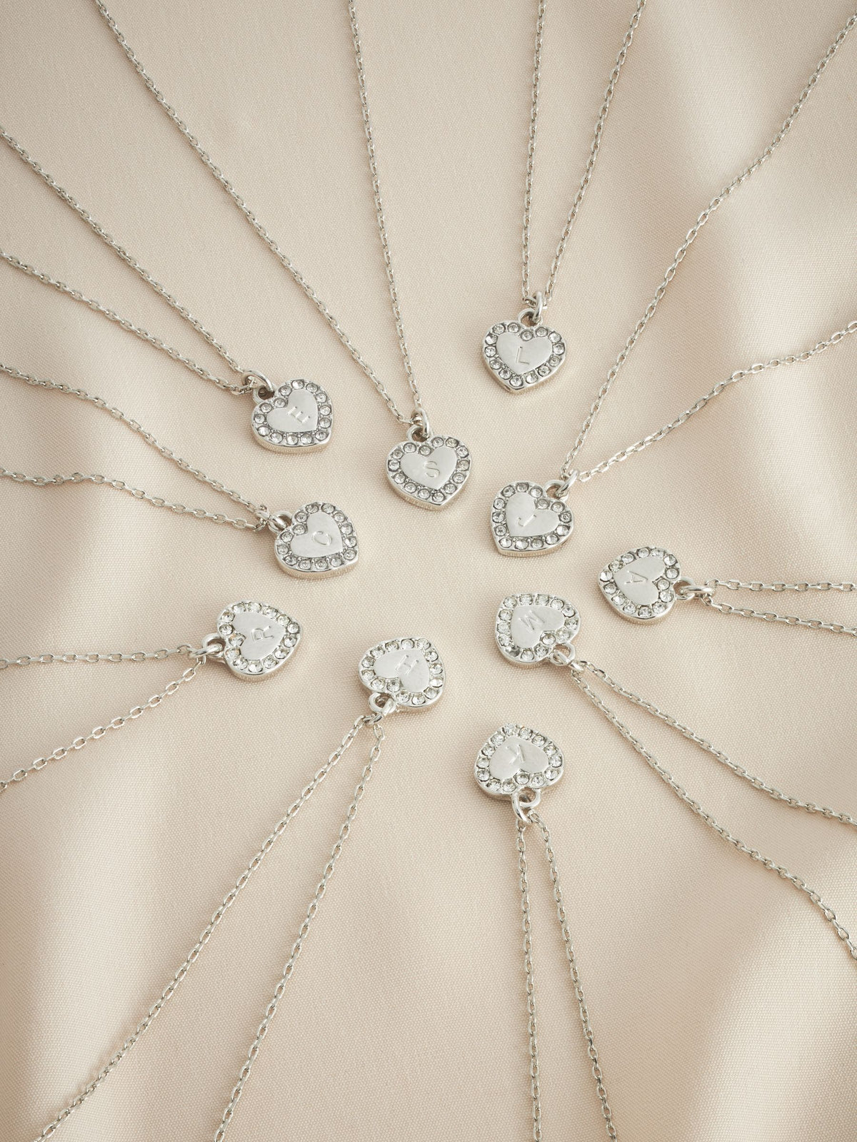 Silver tone heart initial necklace (British brand)