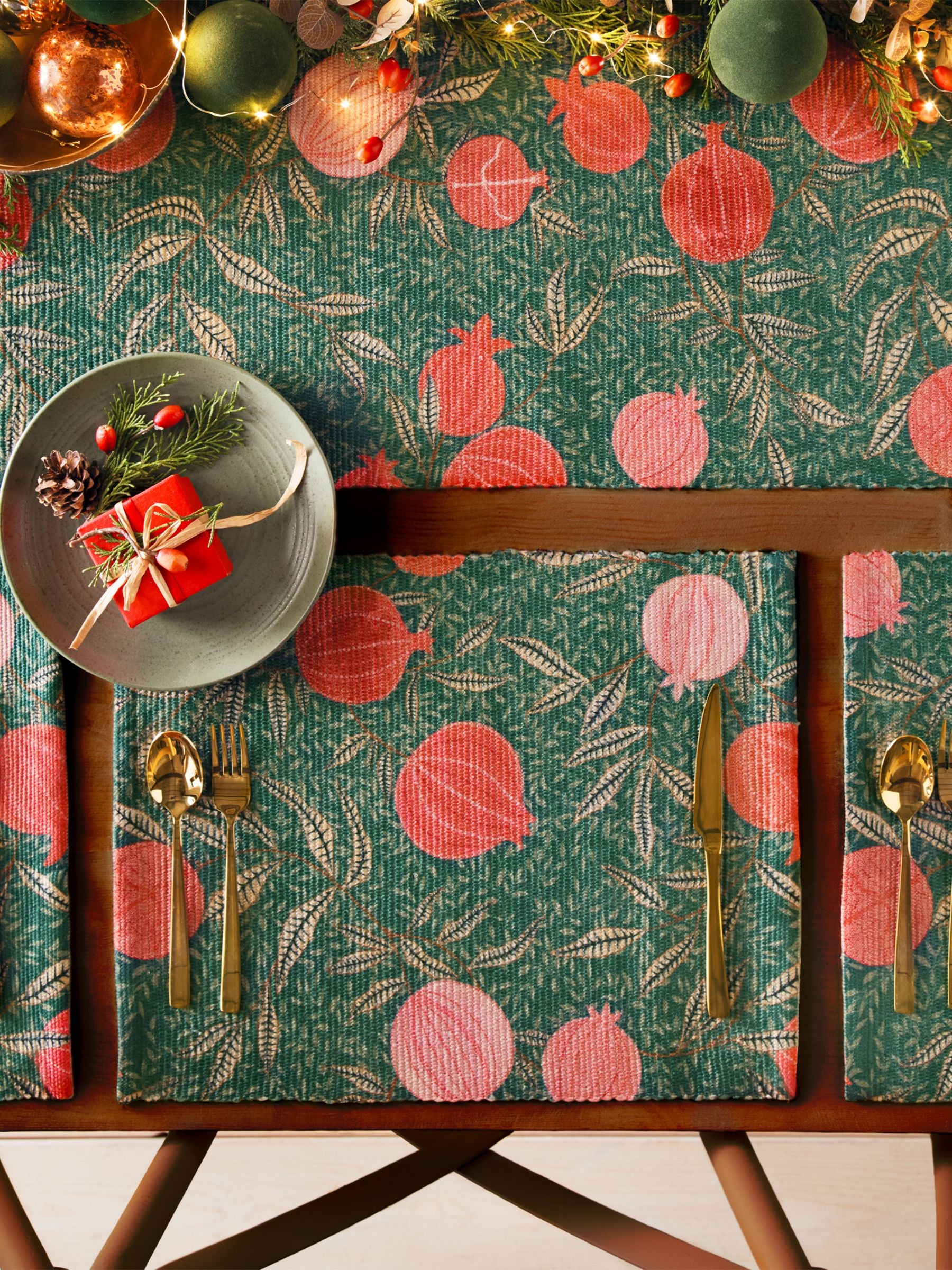 Paoletti green pomegranate Christmas placemats and runner set, imported from the UK