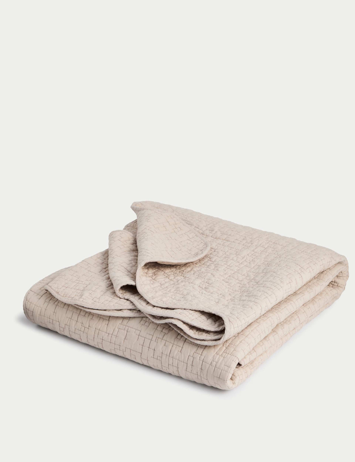 Quilted scallop cotton bedspread, imported from the UK